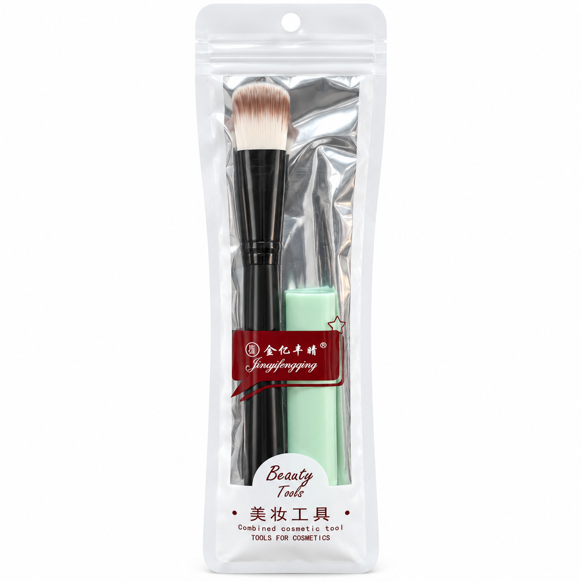 Black makeup brush beside a mint-coloured beauty accessory in clear-front packaging