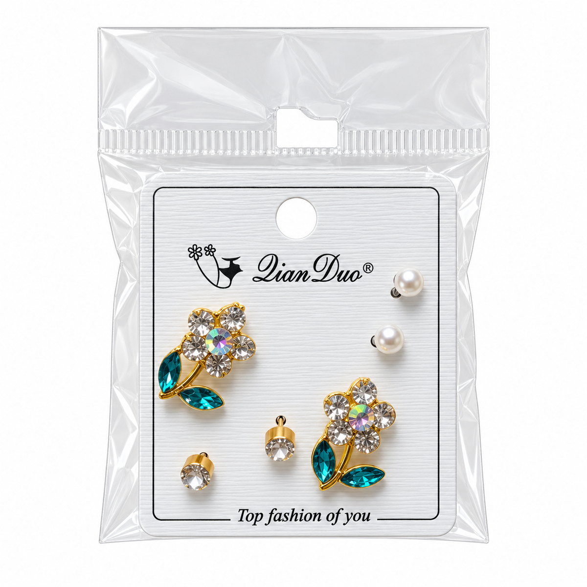 Three pairs of studs with teal flower designs, white pearl-style beads and clear stones