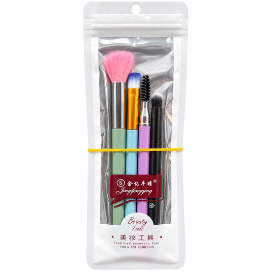 Pastel makeup brushes and a lavender-handled spoolie in a clear-front pouch