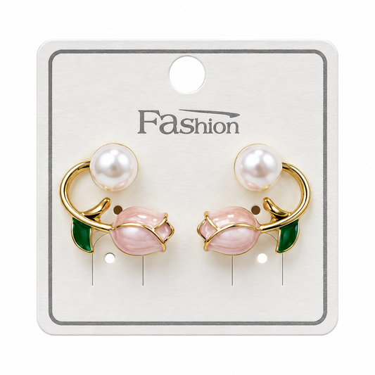 Pink tulip earrings with green leaves, gold-tone curved stems and white pearl-style accents
